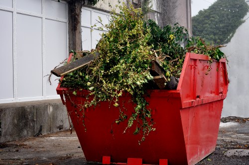 Different types of household waste placed in a domestic skip